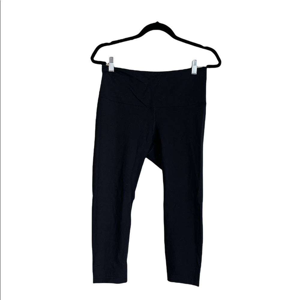 Lalabu baby wearing black leggings